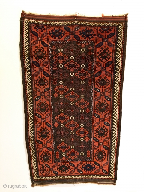 Mina Khani Baluch Rug.  Northeast Iran.  2nd Half 19th Century.  Serrated leaves enclose stepped medallions on chocolate brown field.  Excellent condition considering age.  Original four sides.   ...