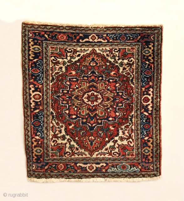 Antique Small Heriz Rug.  Early 20th Century.  Very colorful with strong central medallion.  Mint condition with full pile.  Original four sides.  10 colors.  2’9” x 2’7”.  ...