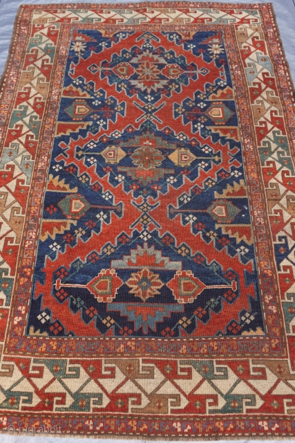 Antique Kazak Caucasian Rug ca.1860s-1880s, measures 5' x 7'8" ft.(152 x 234 cm.)
professionally hand washed.                  