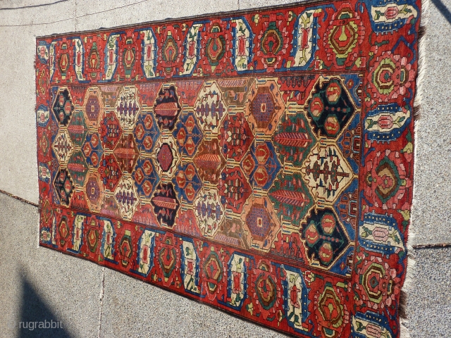 Archaic Bakhtiari 5'8 x 10' recently cleaned and blocked flat by Rbt. Mann.  Suitable as a floor rug for the right collector.  Wide range of colors and patterns which are  ...