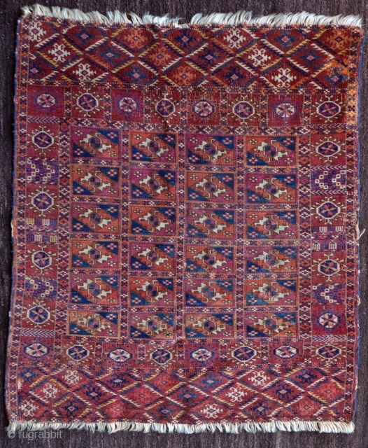 Late 19th century small tekke turkmen rug, possibly a dowry trapping. Great colours – evenly low pile with several small areas of crude repairs and a larger section in the upper selvedge  ...