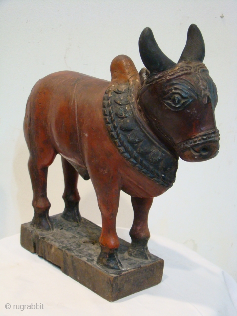  Ethnic Wooden Toy Nandi (Bull), from Maharashtra ( Central India ).

 Very Good Condition , Teak Wood.

 Size: 9 x 27 x 28 cms

 

       