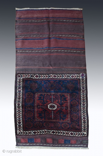 #Antique Baluch bagface 

Wonderfully preserved with minor restored section.
Juicy Velvet pile in deep shades of aubergine and indigo.
Composition consists of nice central bird motif framed with dynamic asymetrical border.
#antique #baluch #saddlebag #rug  ...