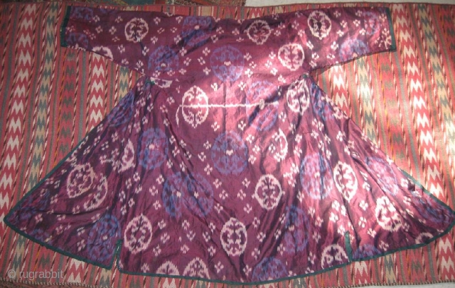 Antique Uzbek ikat coat. In excellent condition, without damaged area, dirty places, only two small holes.                 