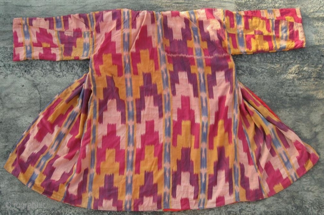 Antique Uzbek silk Ikat coat. In very good condition, without damaged area, holes.                    