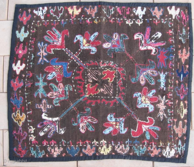 An Uzbek Kungrat or Lakai silk/wool embroidered on wool Ilgitsh hanging, dating between 1880-1900. Size is 62-52 cm, 25-21 inches. Beautiful design and rich colours, natural dyes.      