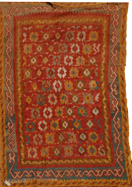 Kilim Rug #1468
Origin: Turkey. Oushak 
Size: 6'7" X 8'11"' 
Age:  approximately 125 - 150 years old 
Wool. Tightly spun. 
Slit tapestry weave. Reversible.

In this kilim we see the colors of early  ...