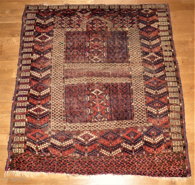 antique Yomud Engsi. Size: 112 x 125 cm. Low pile and used. Very fine knotting.                  