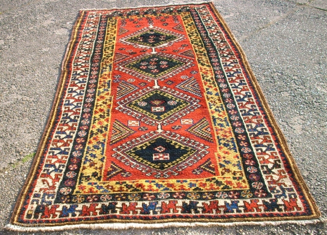 Old nice and special kurdish rug. Size: 134 x 259 cm. Perfect colors. Very good condition. A special main border.             