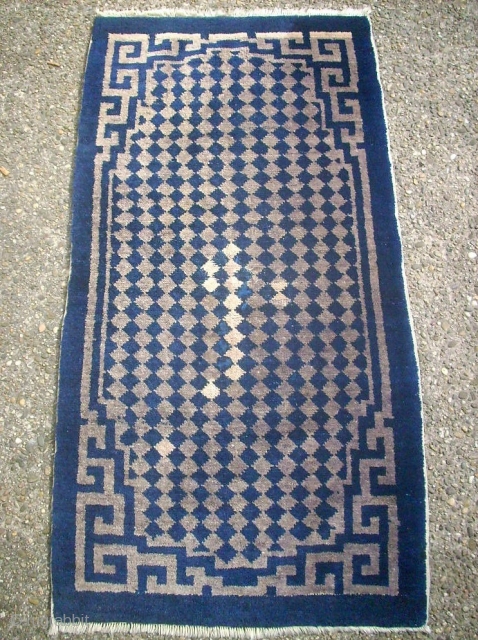 Antique chinese small rug. Size: 57 X 112 cm. Used.                       