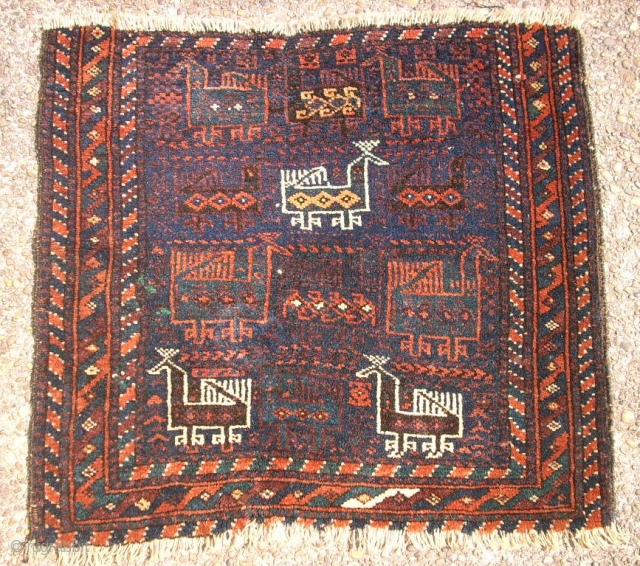 Very old Baluch bird bag face. Size: 65 x 60 cm. Soft and shiny wool. One end (border) miss.              