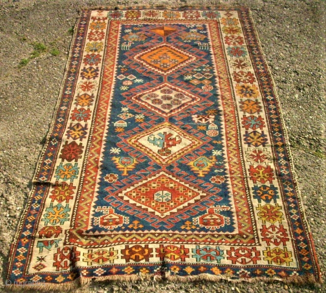 antique caucasian rug. Size: 103 x 178 cm. Used condition.                       