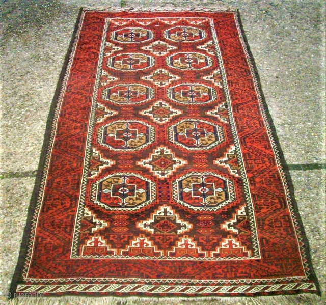 Antique Baluch rug. Size: 107 x 208 cm. With Camel-Wool. One small repair. One small area with thin pile.              