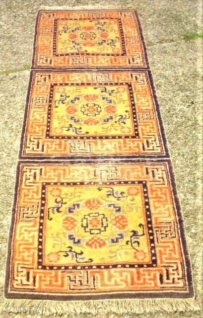 antique Tibet / Chinese sitting-meditation rug. Size: 61 x 183 cm. Some low pile.                   