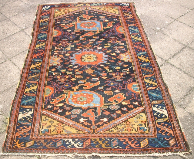 SOLD - THANK YOU! Antik, persian kurdish? rug. very nice colours and interesting ornaments. fine knotting. pile is low. 
Size: 180x110cm            