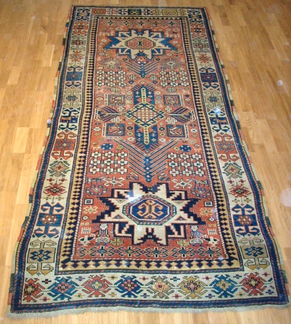 Antique caucasian rug. Size: 253 x 111 cm. Good pile. Very interesting ornaments. Wonderful border.                  