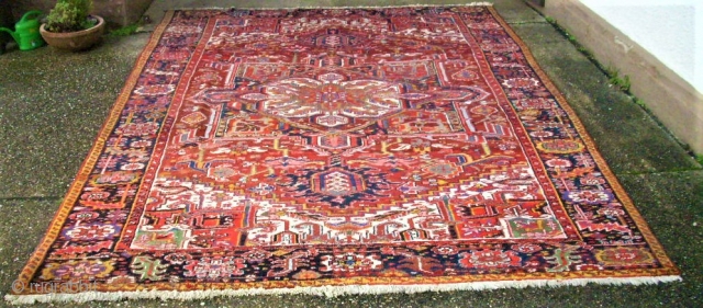 Old persian Heriz. Size: 243 x 353 cm. Good conditon.                       