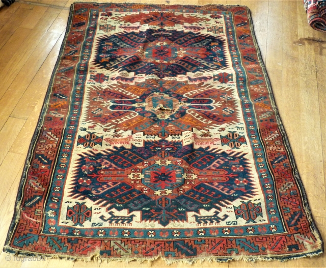 caucasian Zeywa rug. Size: 127 x 174 cm. Bad condition. With holes.                     