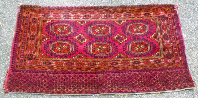 Antique Tekke Tshowal. Size: 84 x 153 cm. Some small repairs. Fine knotting.                    