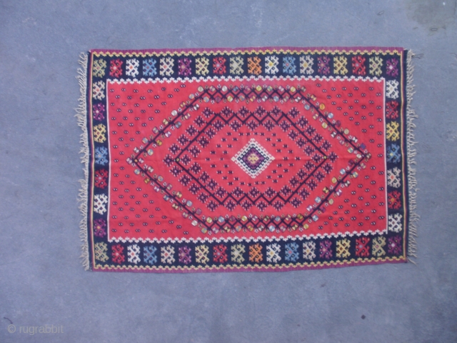 antique sarkoy kilim
age:end of 19th century
dimensions:200x150cm
pattern:venac sa nemacke kutije(wreath with German boxes)
dyed ONLY with natural colors 100%
rear ornament in box border named stolice(chairs)          