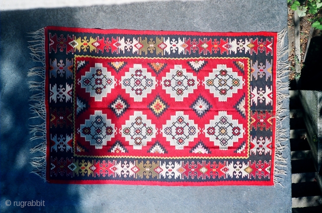 Antique Pirot Sarkoy kilim named Francuske bombone. 
Age: end of 19th century. Dimensions: about 200x150. Very interesting combination of patterns ...            