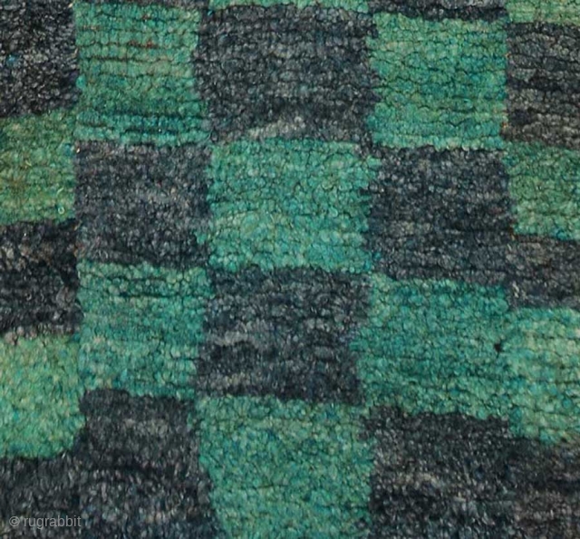 Tibetan three paneled checkered tsuktruk, the three individual strips having been woven separately on a narrow loom and then sewn together to complete the finished product. These tsuktruk type rugs - which  ...