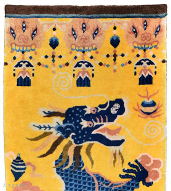 This pillar carpet featuring a five clawed right facing blue dragon on a golden yellow background was made in the Ningxia region of China and was (originally) intended to go around a  ...