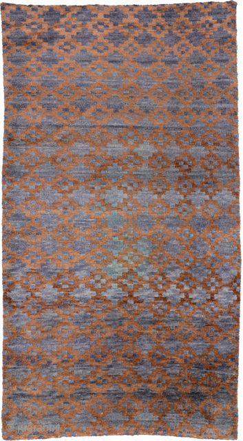 Exceptionally beautiful, intentionally abrashed, Tibetan khaden with all natural dyes. Using the ‘gau box’ (or amulet) design and combining only two colours (brown and blue) with very imaginative mixing, the weaver has  ...