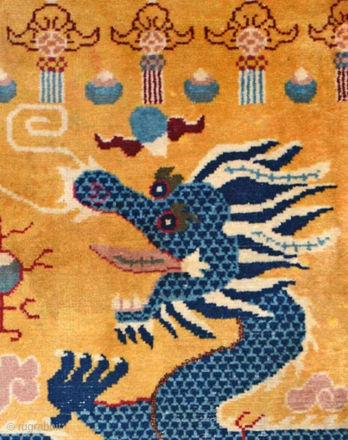 This five clawed left facing blue dragon with burnished yellow background pillar carpet was made in Ningxia and meant to wrap around Buddhist monastery's pillar/s in large 'meditation' halls, so that it  ...