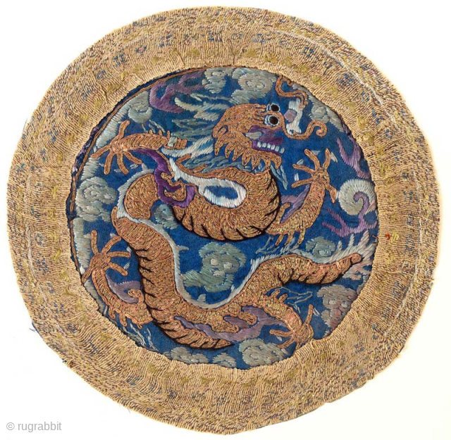 Beautiful Qing / Ch’ing Chinese Imperial Dynasty hand woven roundel depicting a five clawed dragon shown in profile in gold wrapped silk thread and attached to the roundel base using the 'couched  ...