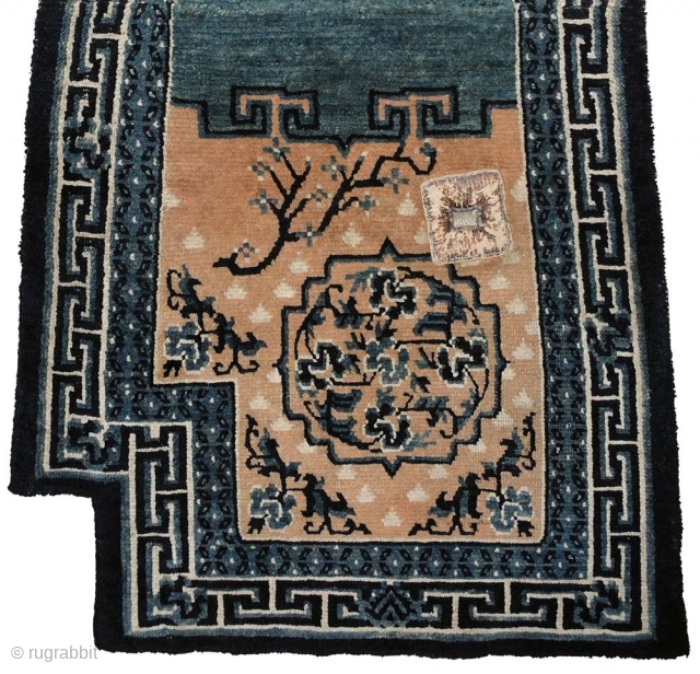 Masterful design execution and wonderful natural indigo dyes went in to the making of this Tibetan Makden. It has a central floral motif on each side which is encased in a mandala  ...