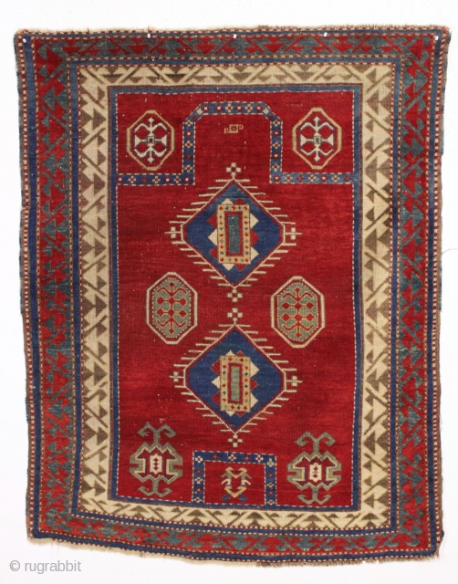 antique bordjalou kazak prayer rug. Iconic design. All natural colors featuring a beautiful red ground, nice old greens and pretty medium blues. Unrestored, near original condition. Slight wear. Could use a bit  ...