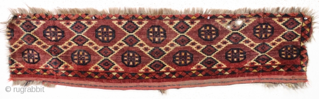 antique turkoman fragment. A high quality ersari beshir jollar or torba with an ikat inspired design. Mostly good pile. All natural colors. Good age, ca. 1875 or earlier. 13" x 53"  