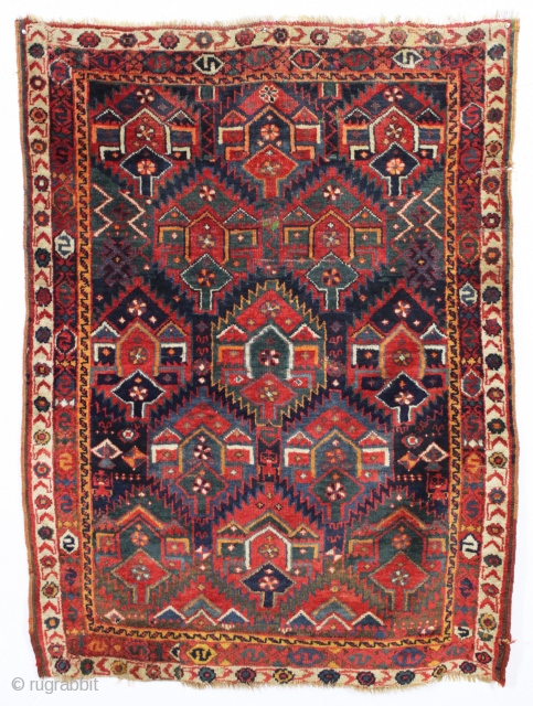 antique kurdish "flaming" palmette rug fragment. Spectacular natural colors and thick glossy wool. As found recently with a little wear, few creases, and inexplicably reduced in length at bottom. Priced accordingly. Could  ...