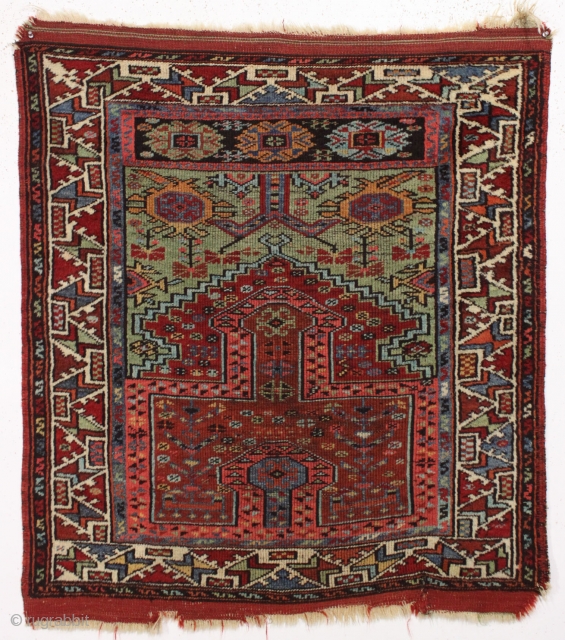 antique little turkish village prayer rug in nearly square in size. Delicately drawn field with an interesting archaic re-entry element. Wide range of colors featuring beautiful greens. Clean and ready for your  ...