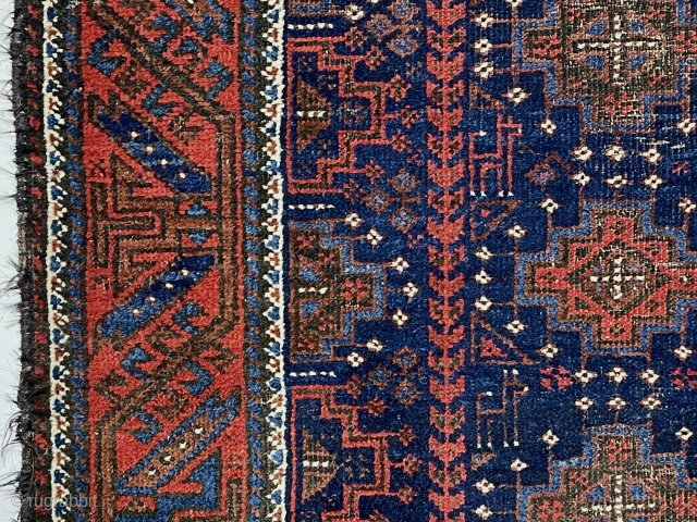 Nice little antique blue ground Baluch rug. Interesting design featuring memling gul like devices and 6 animals. All natural colors including a fine tomato red and electro blue highlights. Fair overall condition  ...