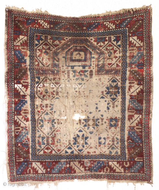 Early but distressed caucasian prayer rug. Unusual to find some original cotton pile. In "New England condition" and priced accordingly. All natural colors. Very dirty. mid 19th c. 3'6" x 4'2"   ...