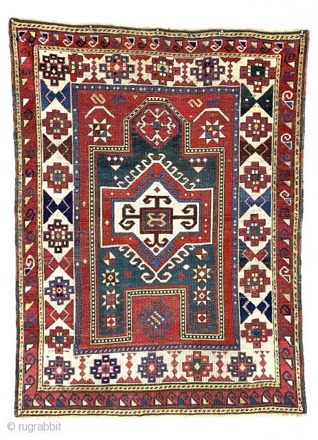 Antique Caucasian Kazak prayer rug with several very interesting features. Unusual eye catching ivory main border and an even more unusual minor border. All good natural  colors including a strong tomato  ...