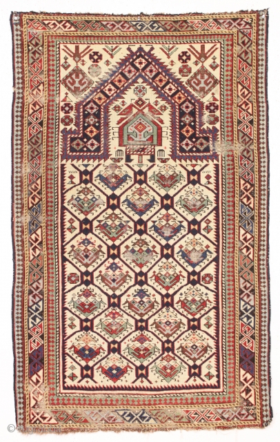 Old caucasian ivory ground prayer rug. First rate early example with splendid natural colors. As found with a bit of wear and oxidation as shown. Very attractive as is and easily restored  ...