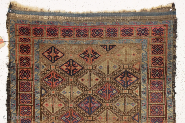 antique baluch rug. Interesting little rug with unusual and attractive coloring. Turkish knotted. As found, dirty with wear and edge roughness as shown. Old cleaning or storage tag included. Late 19th c.  ...