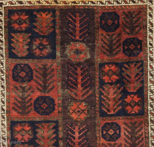 antique little baluch rug with an interesting design. Fair condition with mostly good pile. Heavy brown oxidation. Just aquired, not washed. Bit of selvage rewrapping or repair. No significant repairs. I see  ...