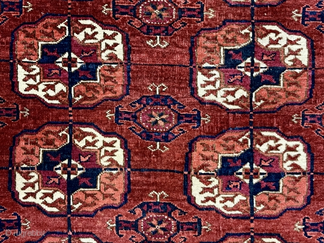 Older little tekke rug with good quality and soft lustrous wool. Nice rounded main guls and attractive minors. Overall mostly fair low pile with scattered wear as shown. A couple small spots  ...