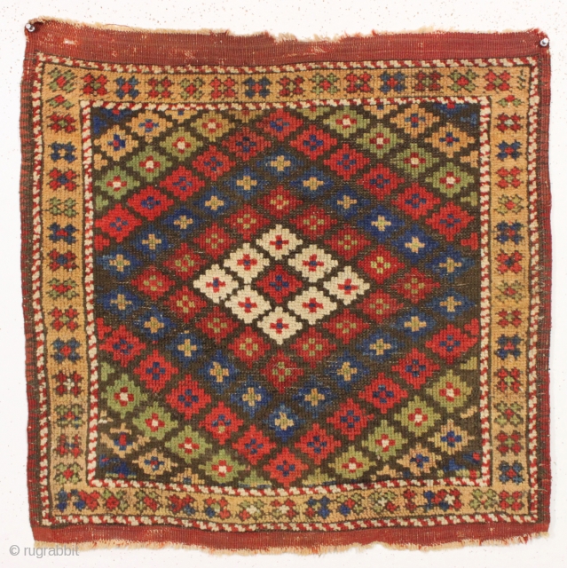 antique little west Anatolian or Bergama nearly square mat. All natural colors featuring pretty greens. Good condition for an older piece. Original characteristic Bergama selvages and end kelim. Clean. Good age, ca.  ...