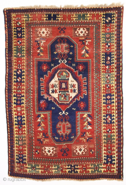 antique large kazak rug with some interesting design features. Appears to have fachralo elements, karachopf elements and a lori pombak motif. The most striking feature however is the unusual and interesting yellow  ...