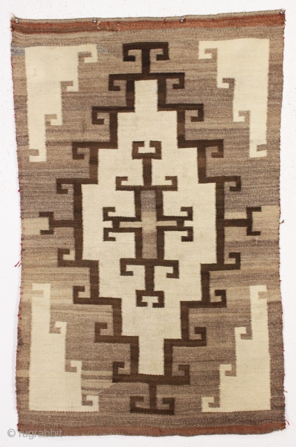 antique little navajo rug with an attractive design. Soft blanket like handle. Reasonably clean and in decent condition. I see one small sewn up repair visible in closeup back pic. late 19th  ...