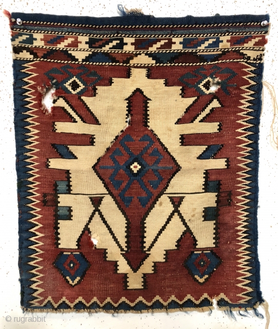 Antique flat woven bagface or panel with a bold uncommon design. Kuba? Avar? Whatever it is, the kuba kelim like medallion is quite eye catching. As found, very dirty with several small  ...