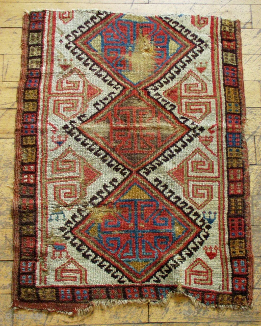 Antique Turkish yastik fragment. Nice older example of the type but in "as found" condition. All good natural colors. 19th c. 2' 2" x  2' 10"      