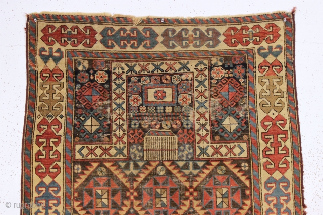 antique caucasian akstafa prayer rug. Classic long narrow format with a squared mihrab. "as found", unrestored and very dirty with scattered wear and a bit of edge damage as shown. All natural  ...