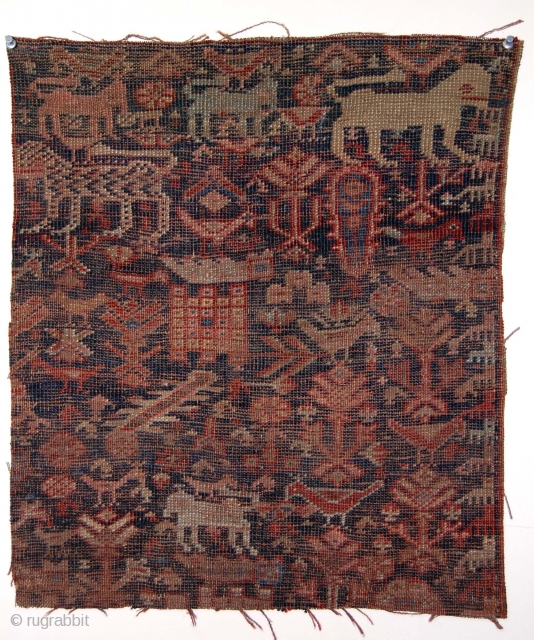 Another antique SW Persian rug fragment. Charming menagerie with a lion, a tiger, many birds, dogs in a forest of  vegetation?. Lower than low pile. Almost imaginary. Color? Age? 18" x  ...