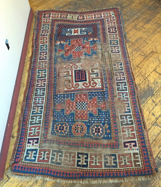 Antique large older Kazak rug with Karachopf type elements. As found, very dirty with wear and brown oxidation as shown. All good natural colors. Storage clean out priced. Good age, ca. 1875.  ...